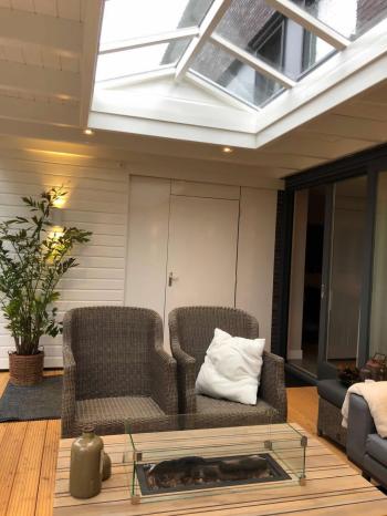 Douglas overkapping in Amersfoort met lichtstraat balustradeen vlonder